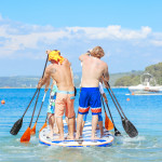 Stand UP paddleboard team rowing